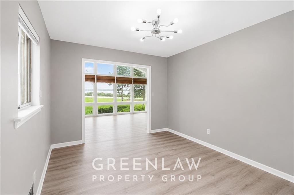 3605 Flat Shoals Road Atlanta, GA 30349 - Photo 8 of 35 a view of an empty room with a window