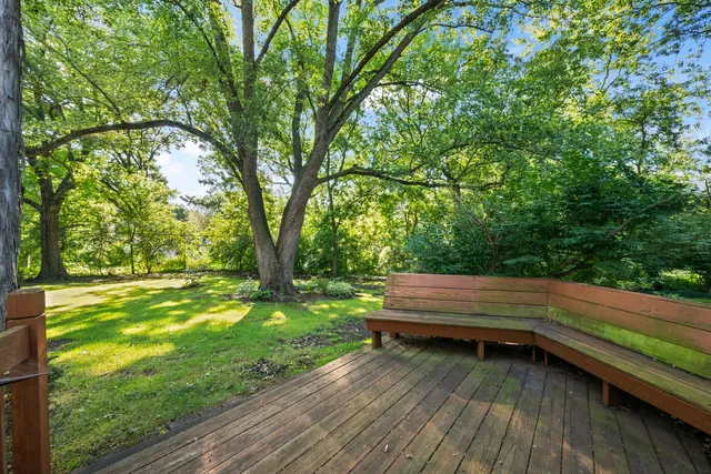 a view of a yard with wooden floor and outdoor space