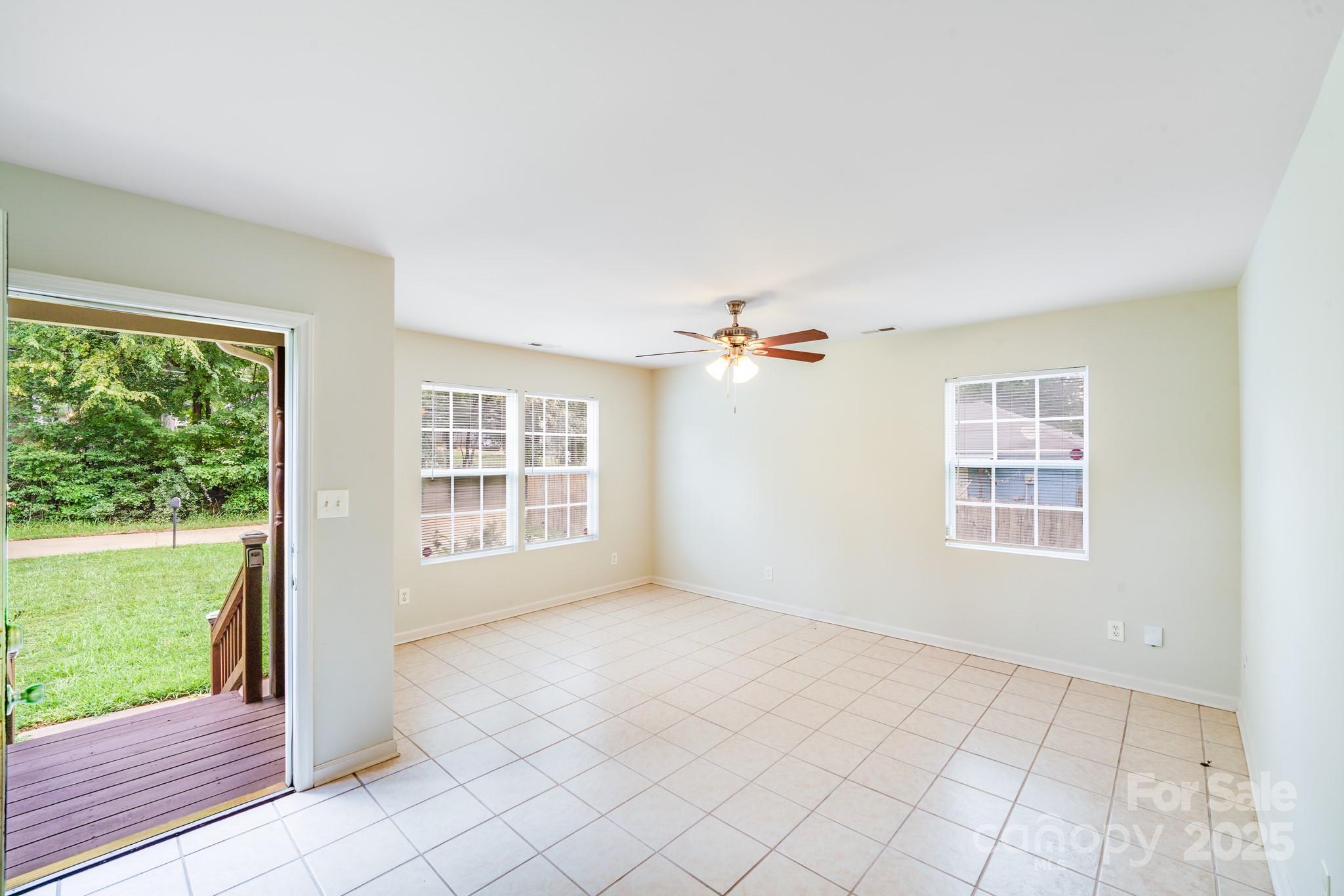 8905 Moores Chapel Road Charlotte, NC 28214 - Photo 2 of 22 a view of an empty room with a window