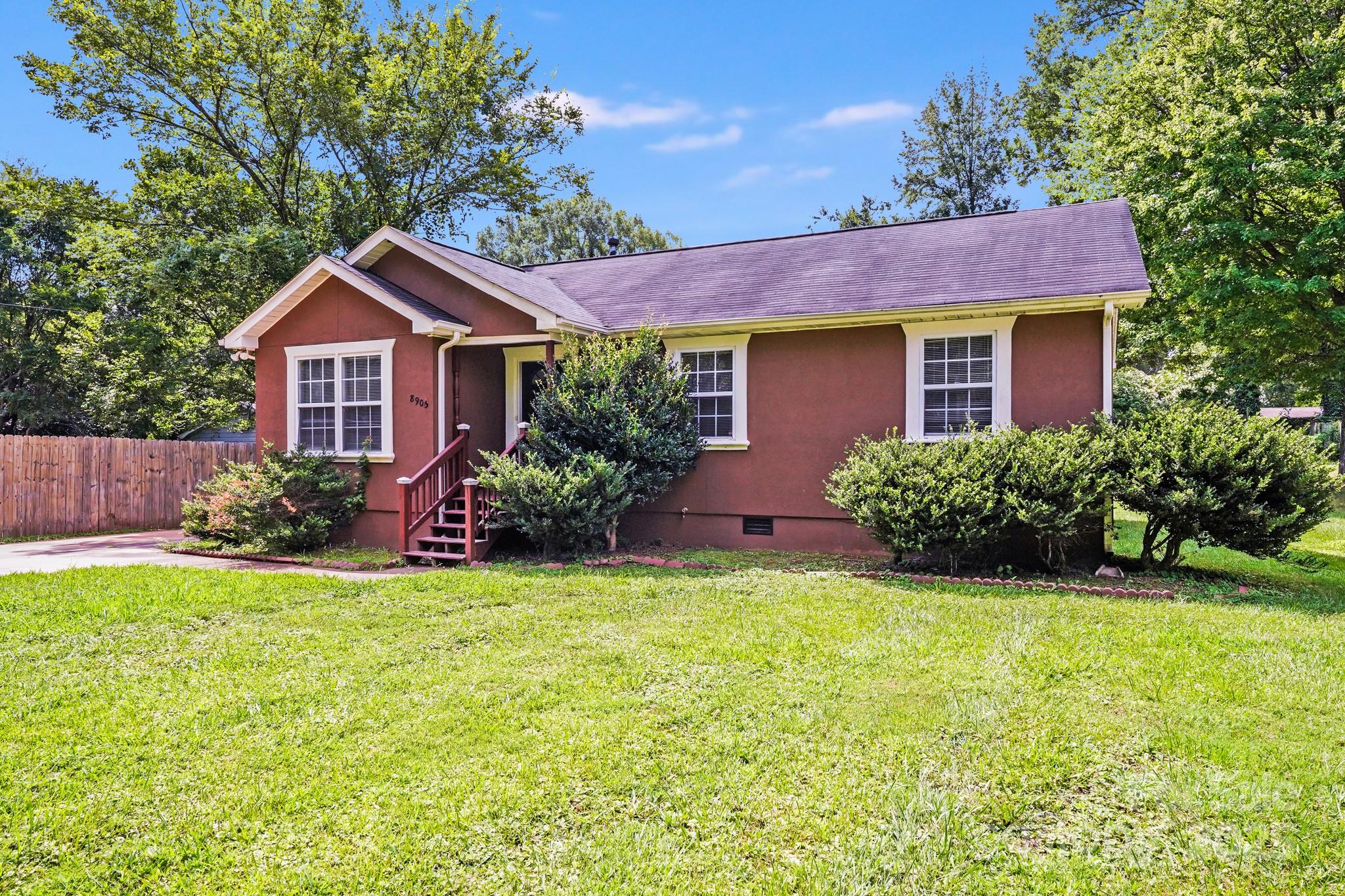 8905 Moores Chapel Road Charlotte, NC 28214 - Photo 22 of 22 a front view of a house with a yard