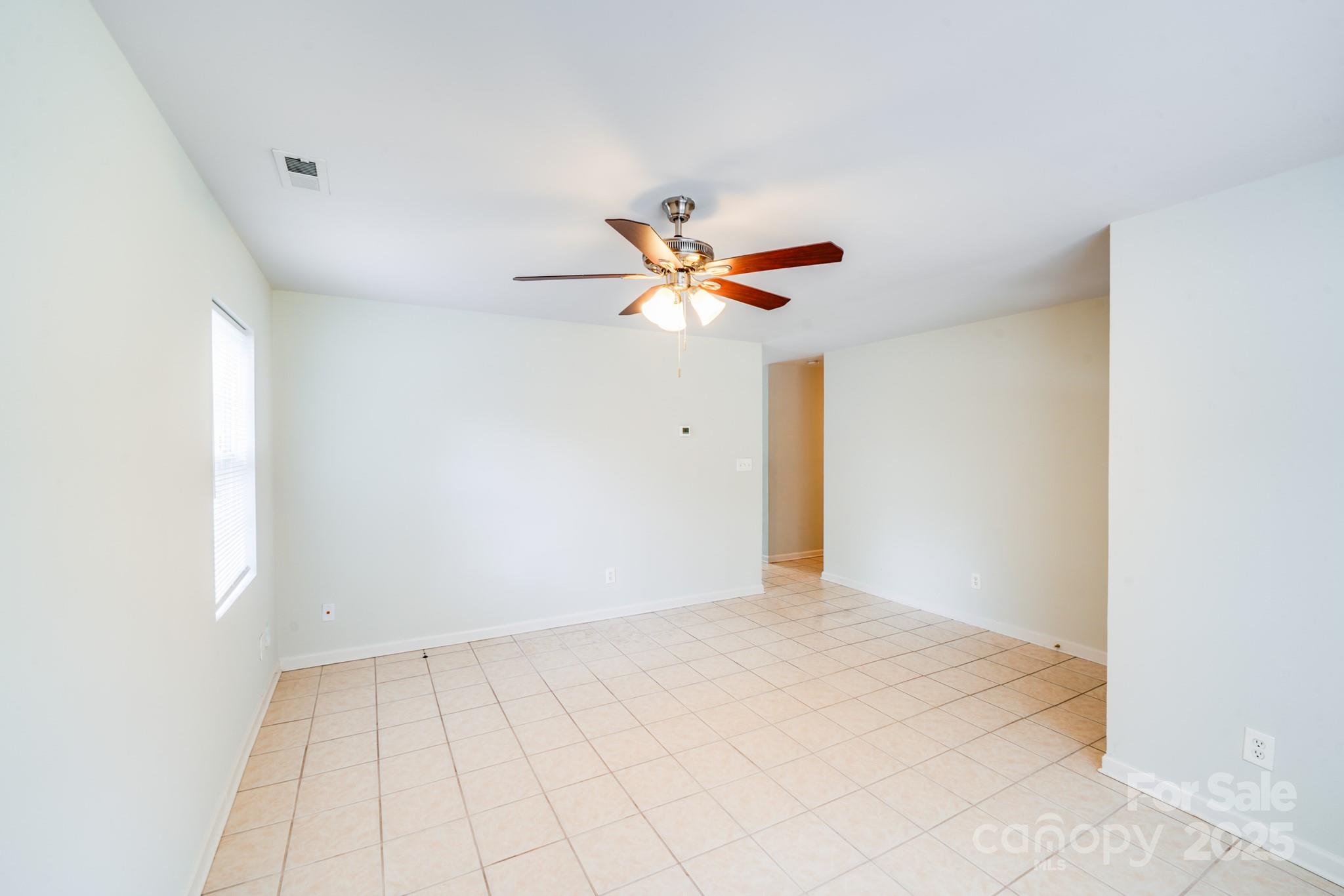 8905 Moores Chapel Road Charlotte, NC 28214 - Photo 3 of 22 a view of an empty room