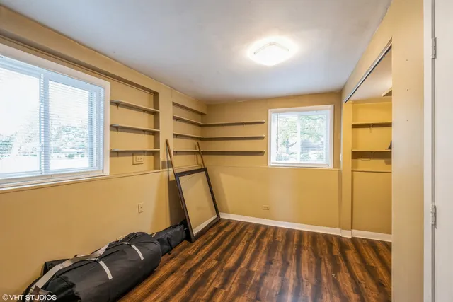 a view of a room with wooden floor and iron walls