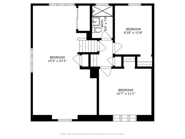 a picture of floor with a white wall and a painting