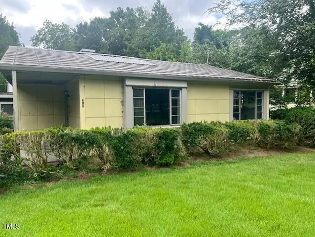 a view of a house with garden