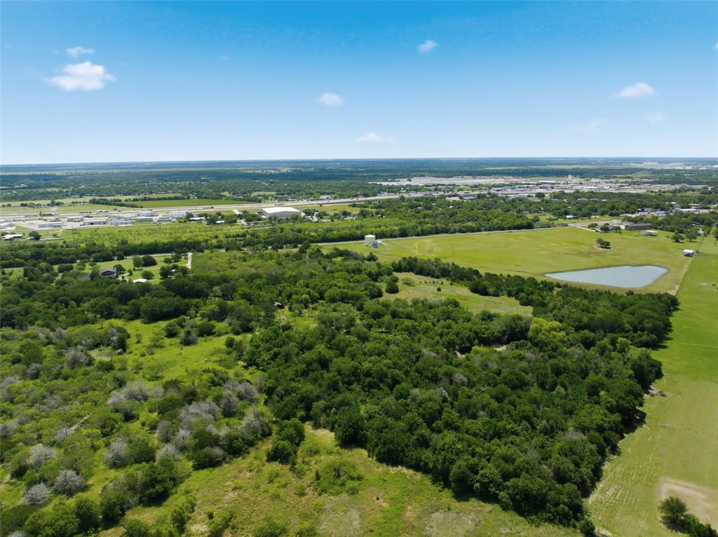 663 North Katy Road Elm Mott, TX 76640 - Photo 19 of 25 Undeveloped land featuring mature tree cover and open grassy areas