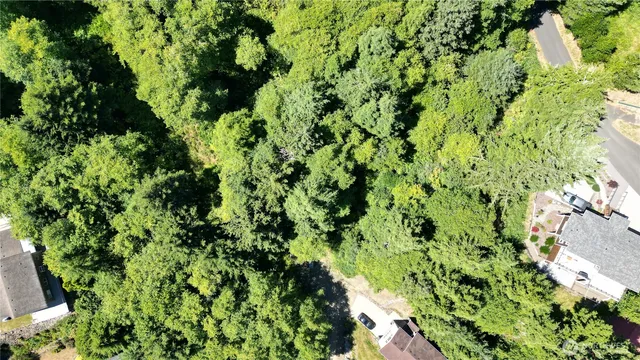 a view of lake with mountain in background