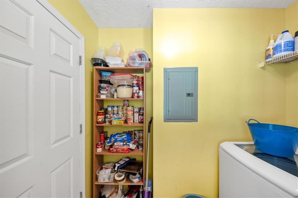 221 Pleasant Way Temple, GA 30179 - Photo 17 of 36 a view of a utility room with fridge and closet