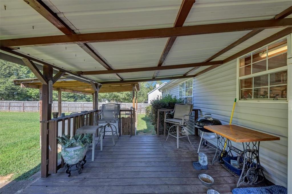221 Pleasant Way Temple, GA 30179 - Photo 28 of 36 a view of a chairs and table in the patio