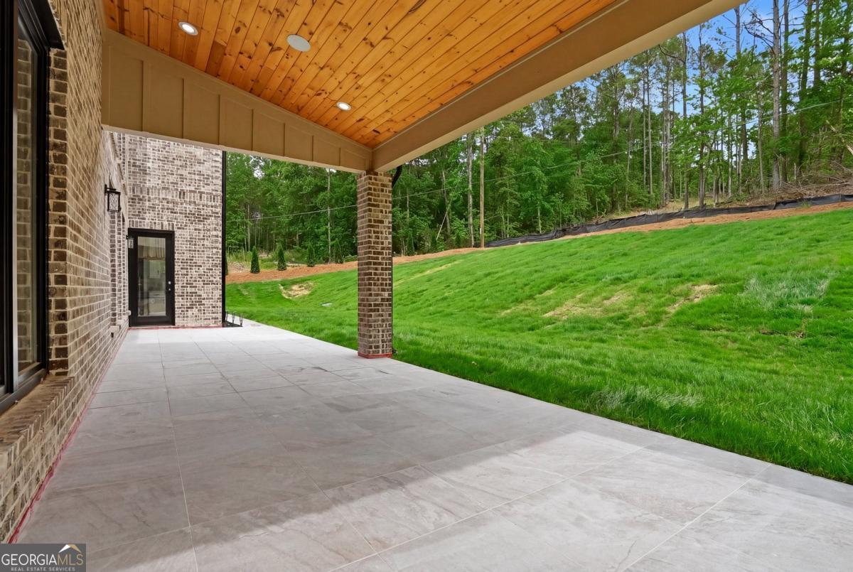 1557 Whitley Road Dacula, GA 30019 - Photo 39 of 46 a view of a patio with a yard