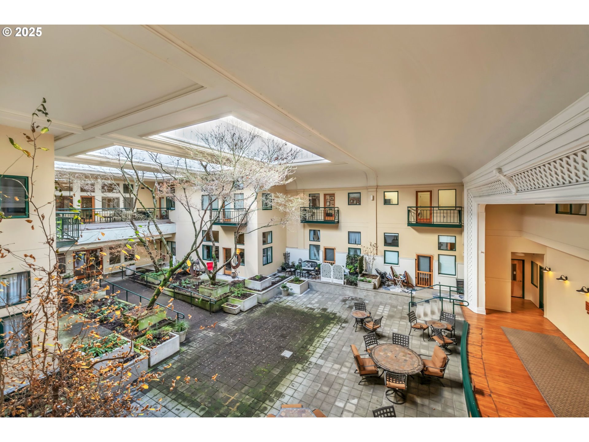 650 West 12th Avenue, Unit 211 Eugene, OR 97402 - Photo 5 of 39 a living room with furniture and a large window