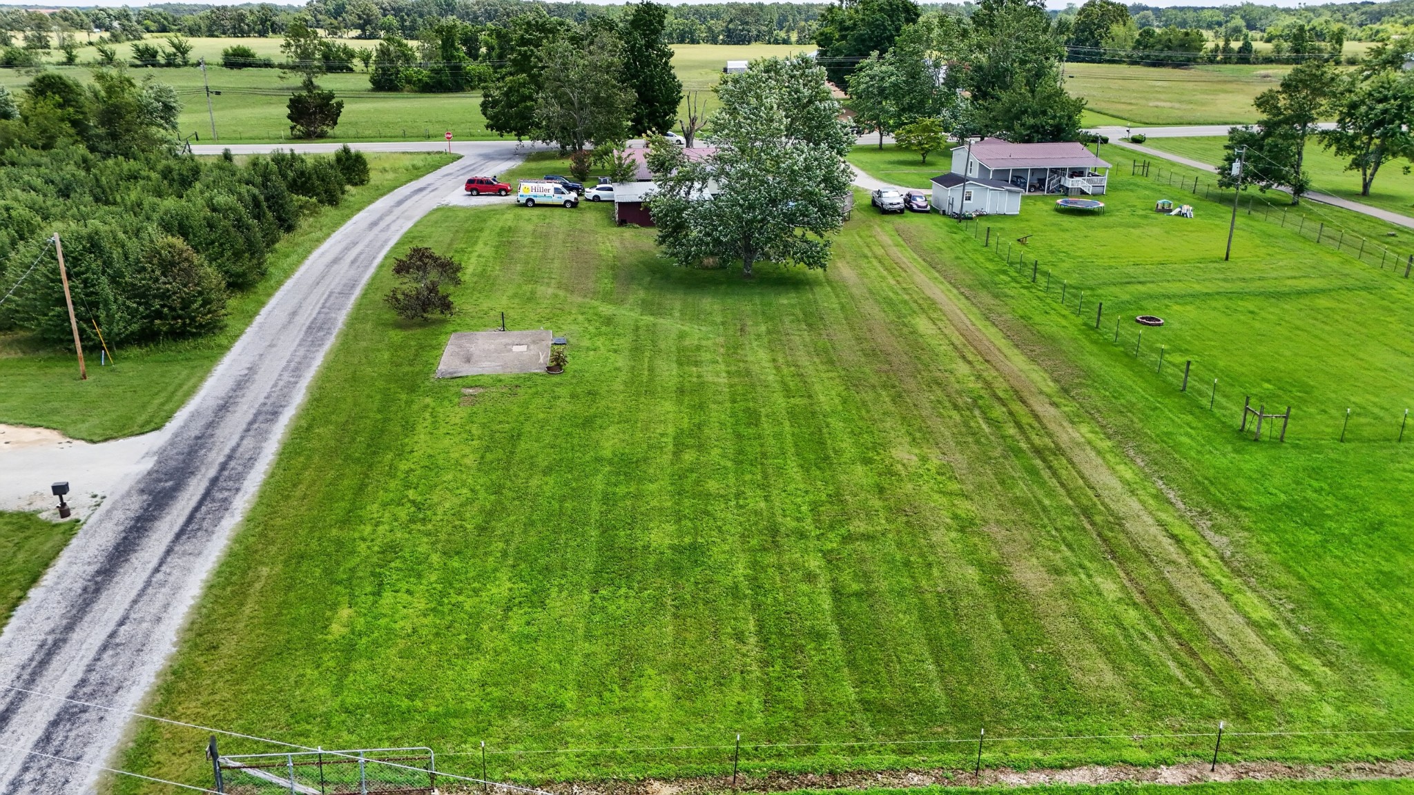 830 Buffalo Road Hohenwald, TN 38462 - Photo 4 of 22 a view of a lake with huge green field