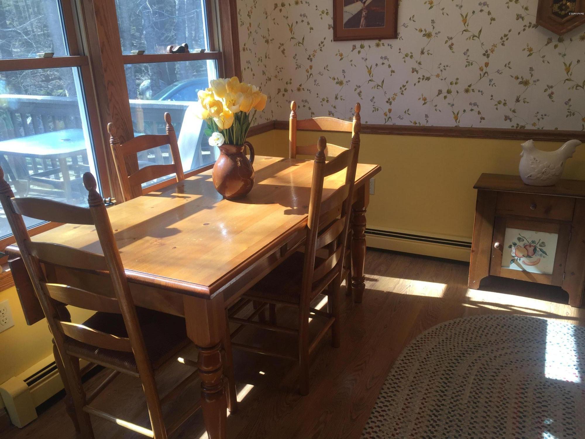 117 Clark Wright Road Middlefield, MA 01050 - Photo 12 of 22 a view of a dining room with furniture and chandelier