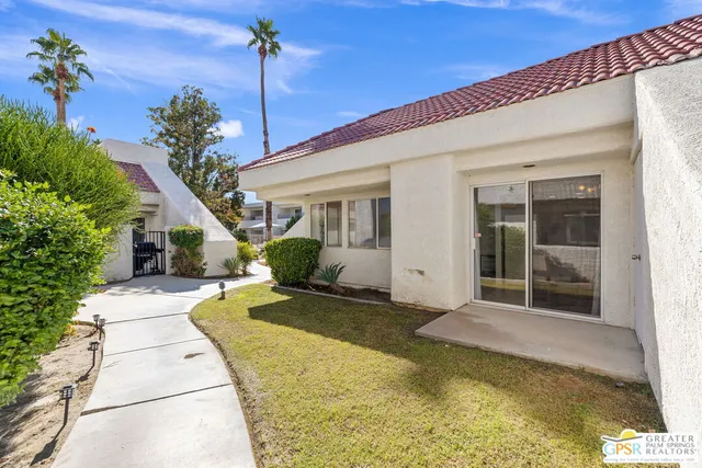 a house view with a outdoor space