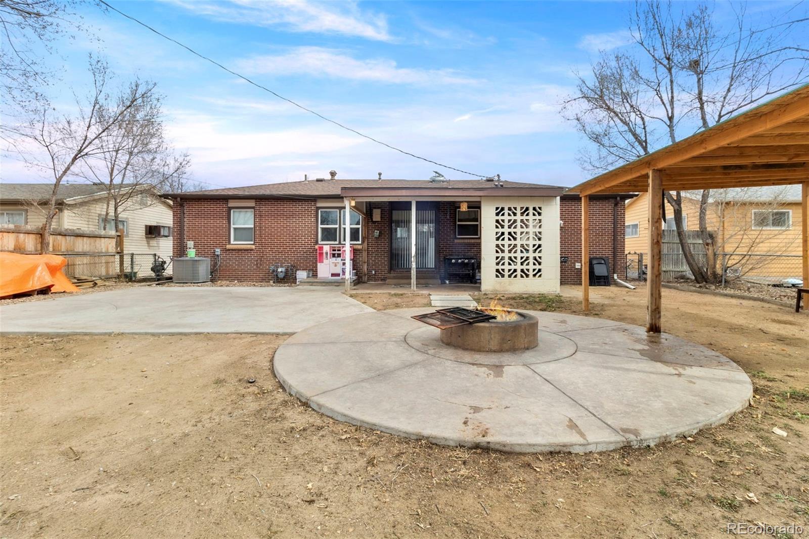 505 26th Avenue Greeley, CO 80634 - Photo 14 of 18 a view of a house with a swimming pool