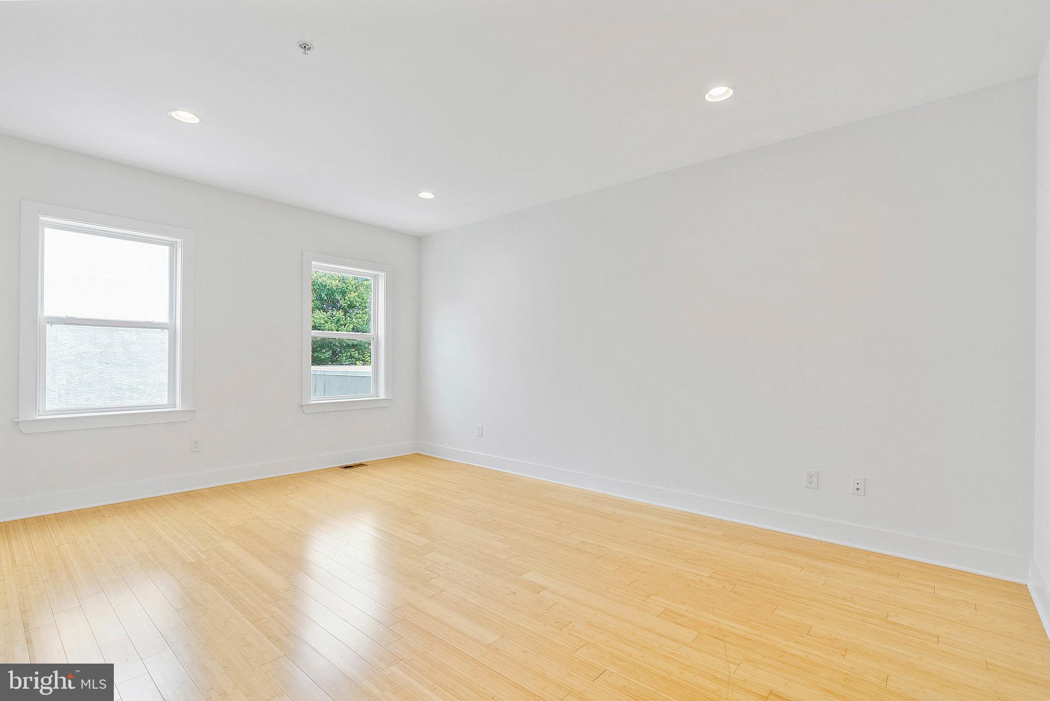 2103 East Susquehanna Avenue Philadelphia, PA 19125 - Photo 22 of 31 an empty room with windows