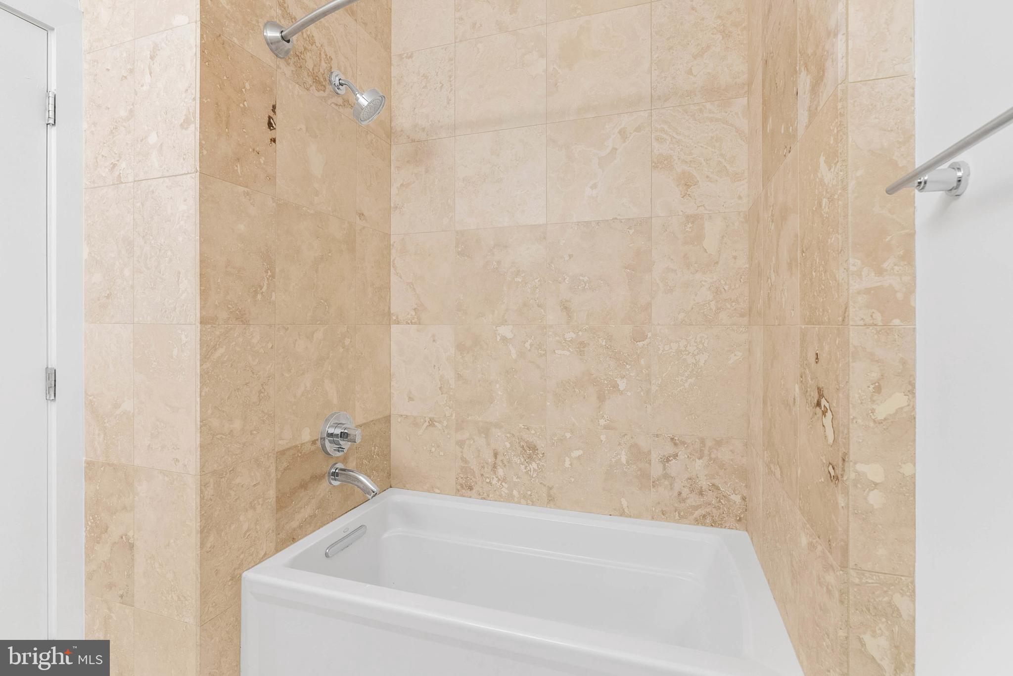 2103 East Susquehanna Avenue Philadelphia, PA 19125 - Photo 25 of 31 a bathroom with a bathtub