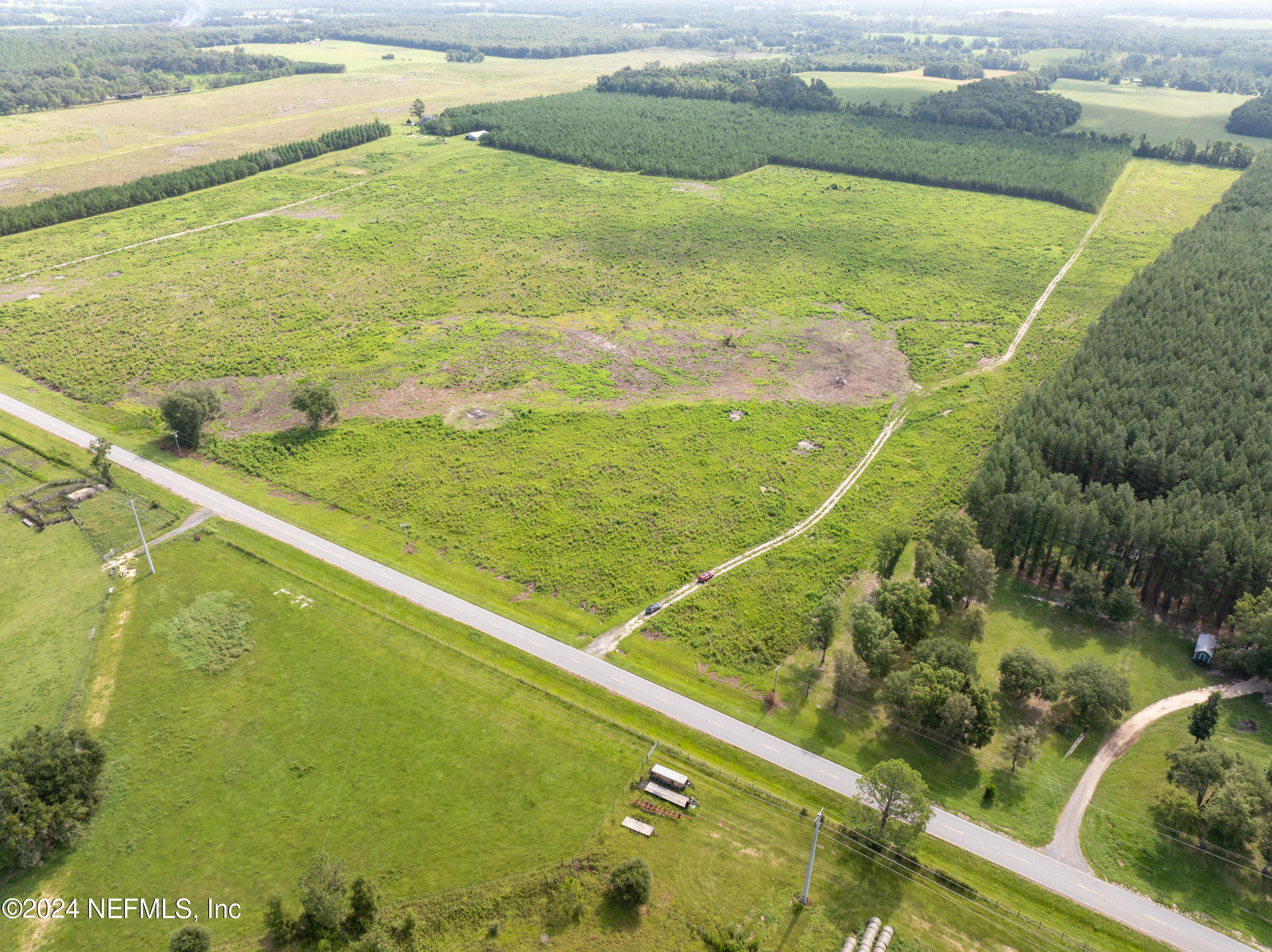 Vacant88 Northeast Rocky Ford Road Pinetta, FL 32350 - Photo 11 of 12 a view of a swimming pool and an outdoor space