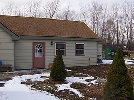 1036 Guerin Road, Unit B Green Oaks, IL 60048 - Photo 1 of 1 a front view of a house with a yard