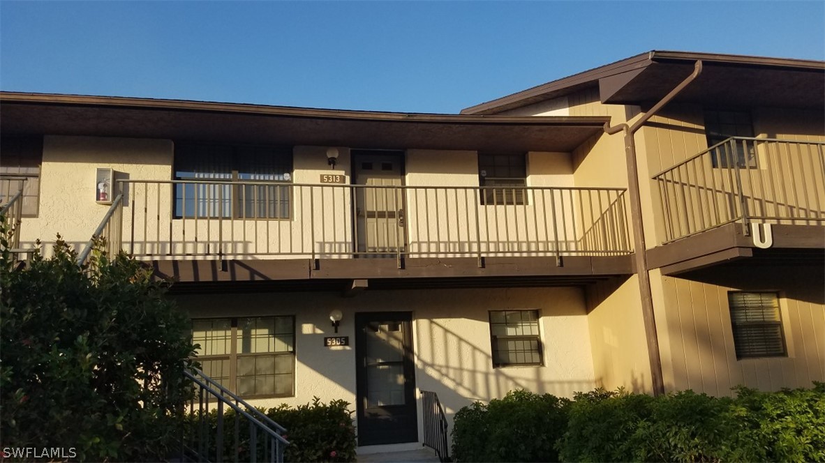 a view of a house with a balcony