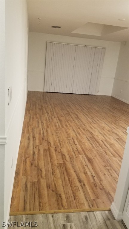5313 Treetops Drive, Unit 202 Naples, FL 34113 - Photo 3 of 22 a view of wooden floor