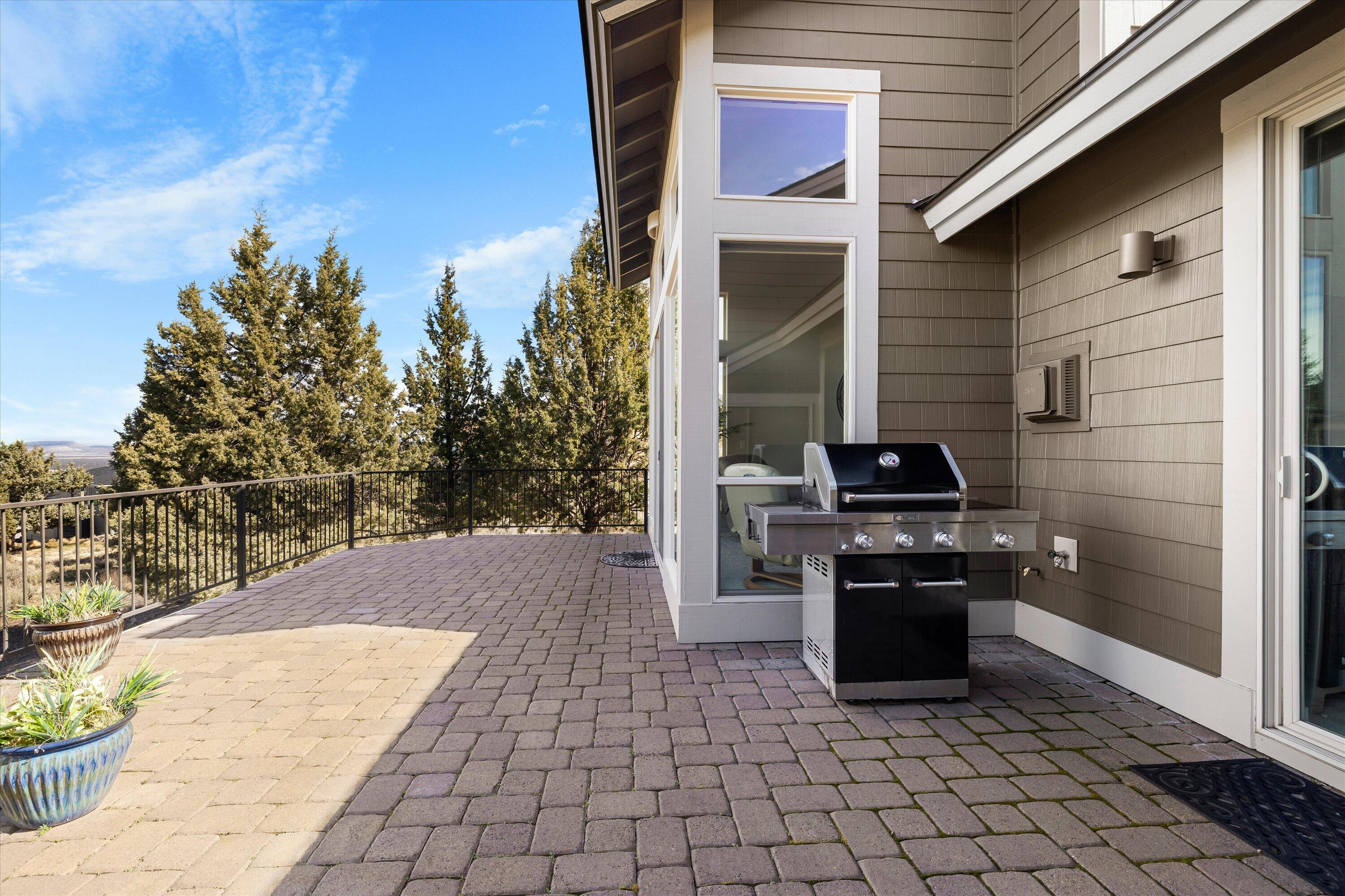 10879 Village Loop Redmond, OR 97756 - Photo 25 of 37 Large outdoor paver deck