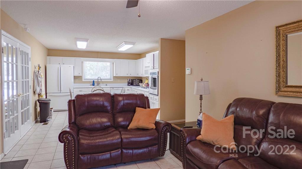 11128 Mallard Creek Road Charlotte, NC 28262 - Photo 11 of 47 a living room with furniture