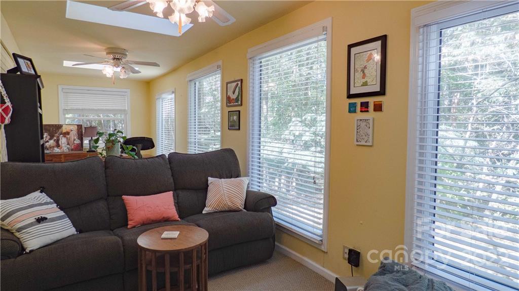 11128 Mallard Creek Road Charlotte, NC 28262 - Photo 19 of 47 a living room with furniture and a window