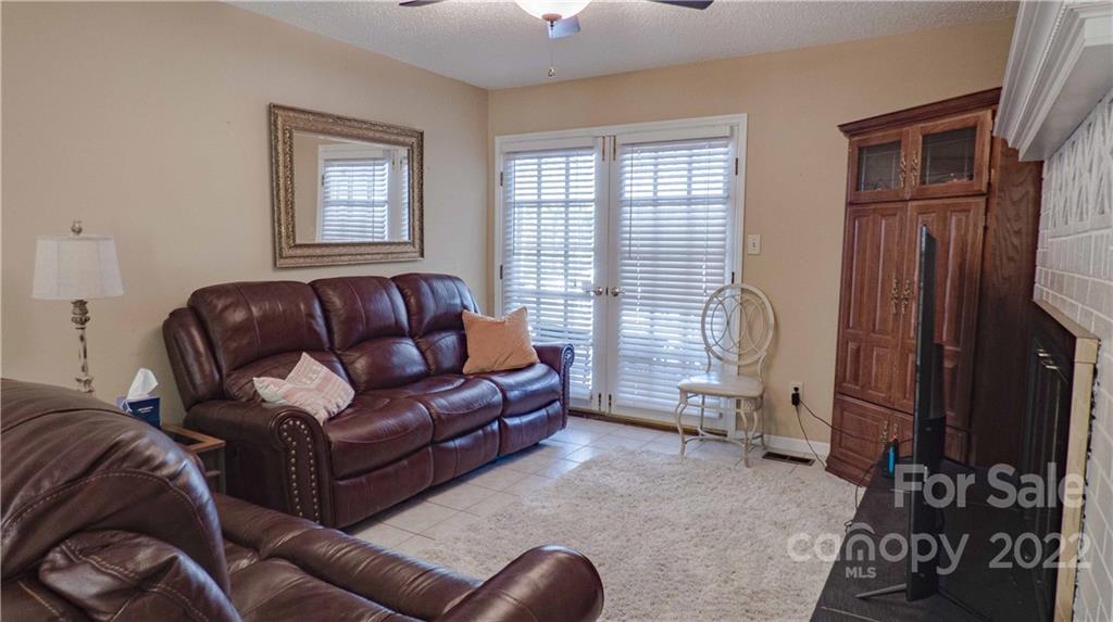 11128 Mallard Creek Road Charlotte, NC 28262 - Photo 9 of 47 a living room with furniture