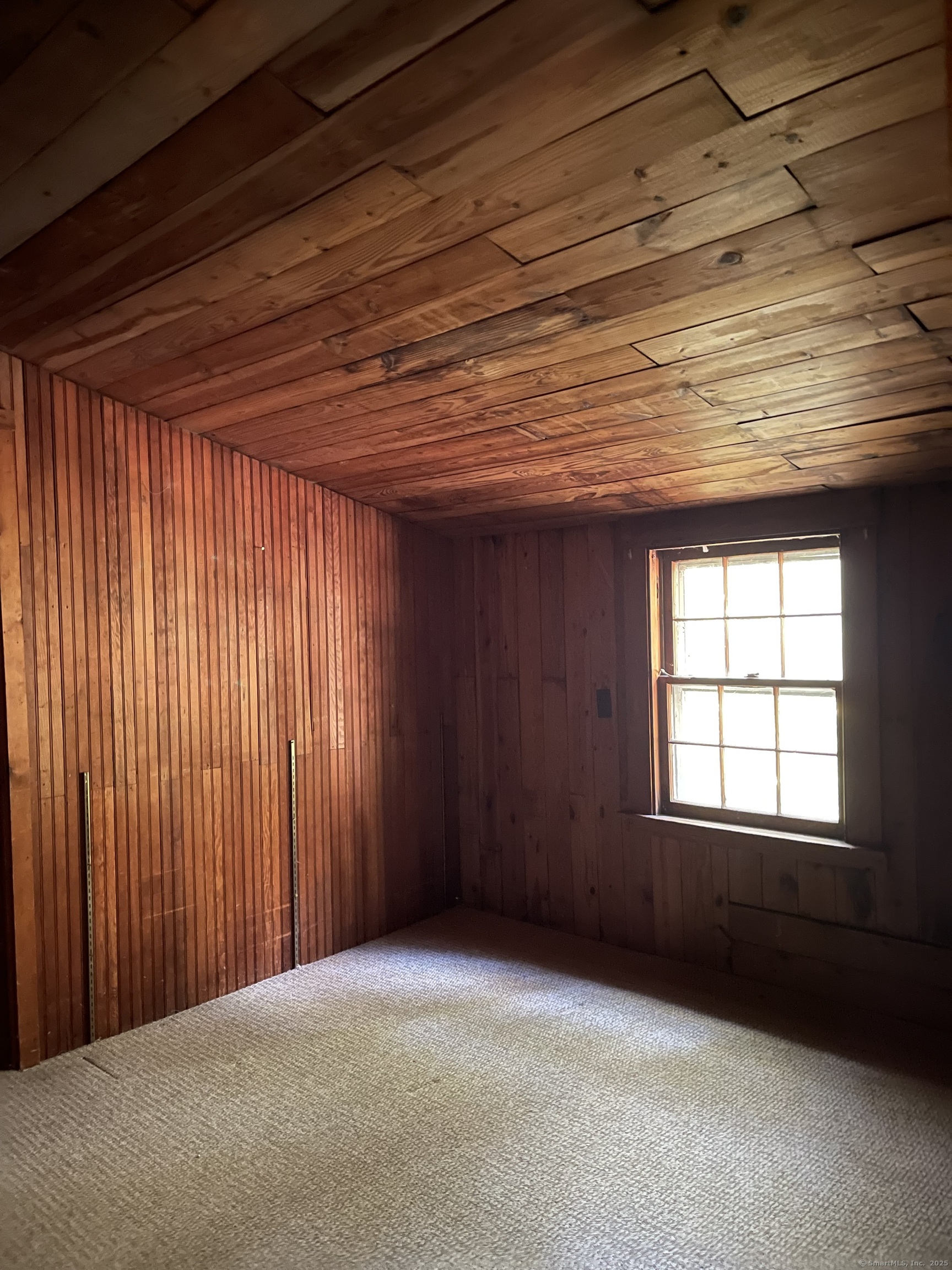 1142 Sperry Road Cheshire, CT 06410 - Photo 12 of 16 a view of an empty room with a window