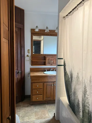 a kitchen with a stove and a refrigerator