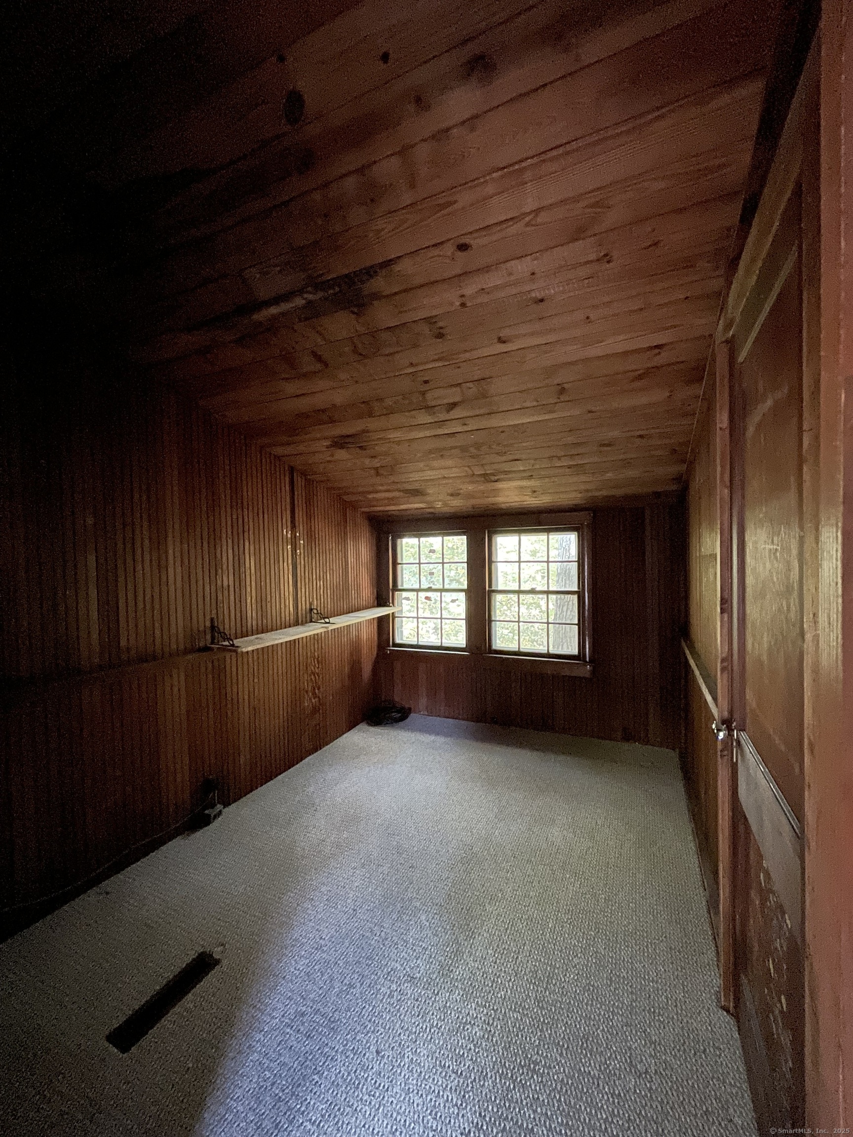 1142 Sperry Road Cheshire, CT 06410 - Photo 9 of 16 a view of an empty room with a window