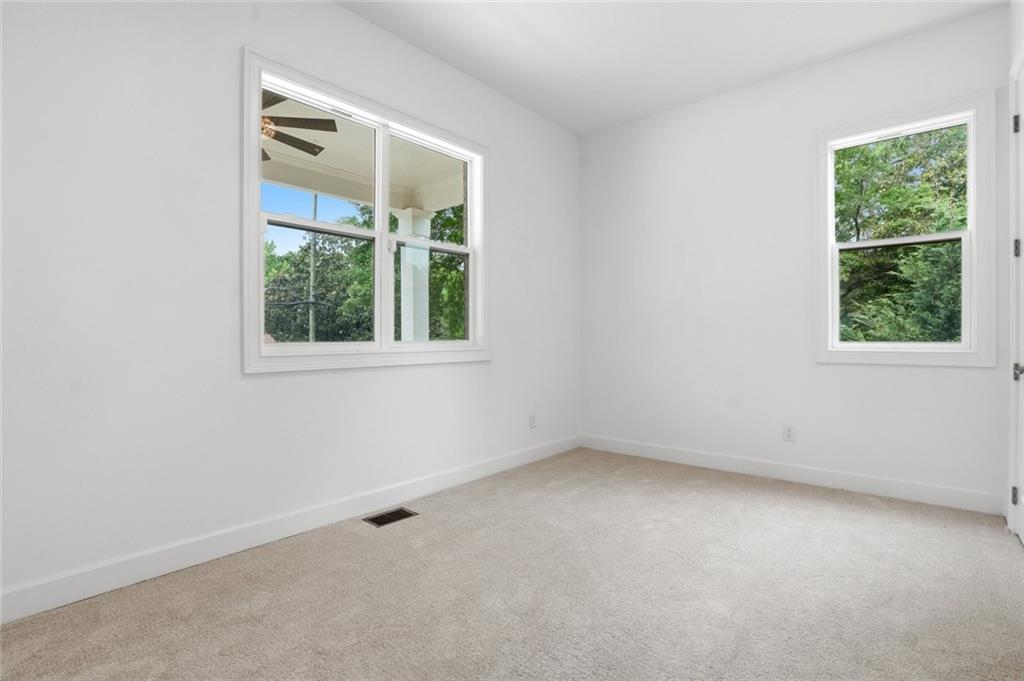 2415 West Rugby Avenue Atlanta, GA 30337 - Photo 20 of 40 an empty room with a window