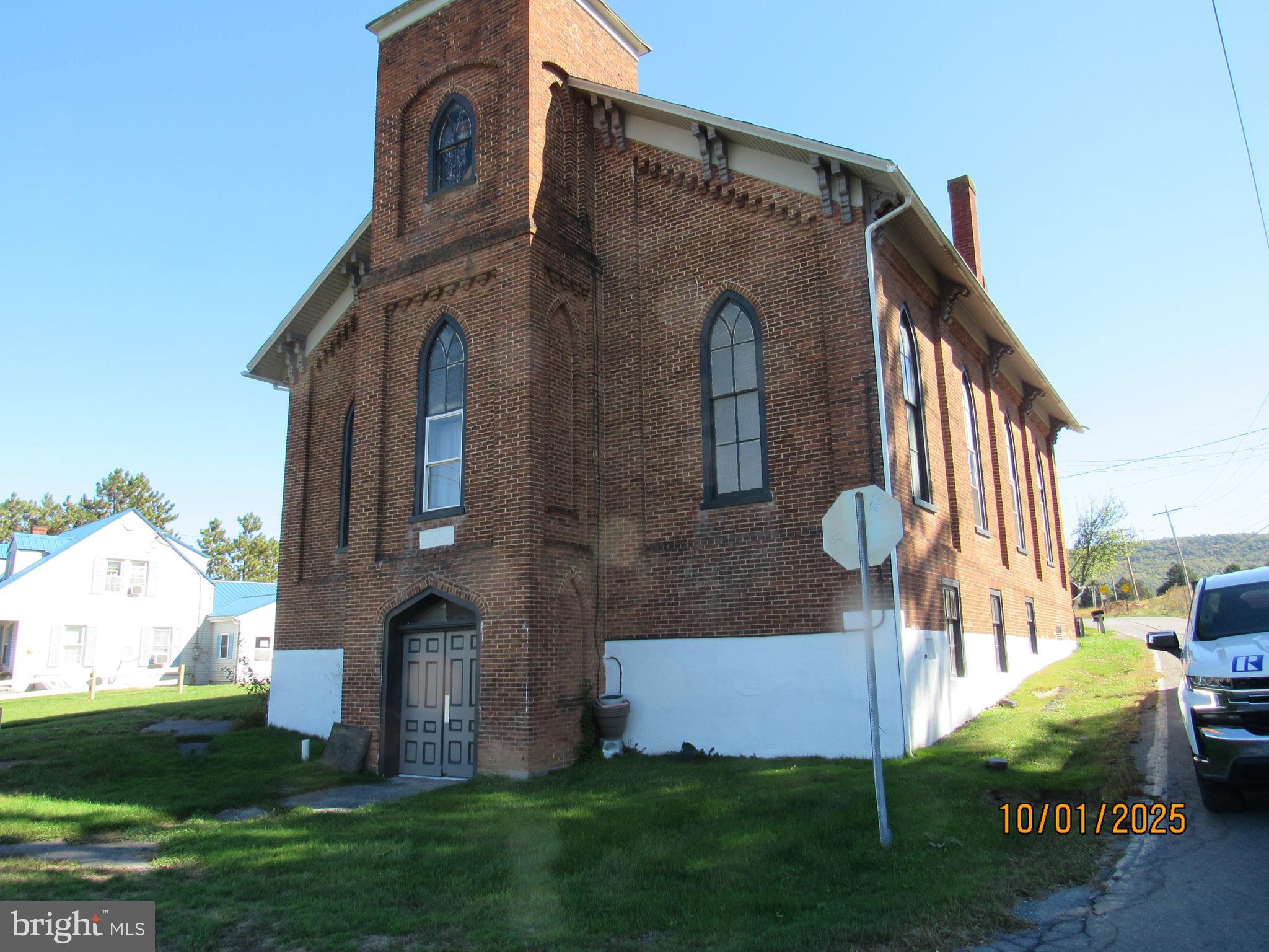 3290 Zion Road Bellefonte, PA 16823 - Photo 2 of 11 a front view of house with yard