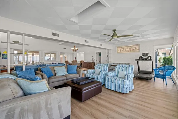 a bedroom with a large bed and a dresser