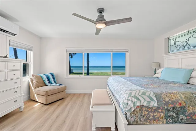 a bathroom with a sink mirror toilet and shower