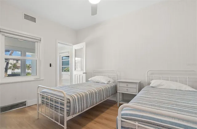 a view of house with patio and yard