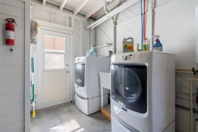 a view of an ocean with seating area