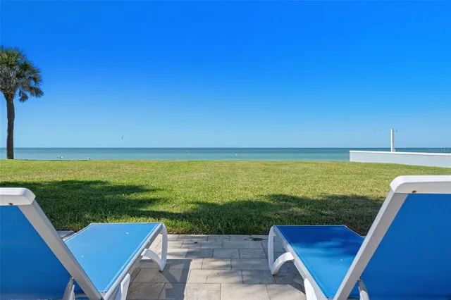 a view of swimming pool with outdoor space and seating area