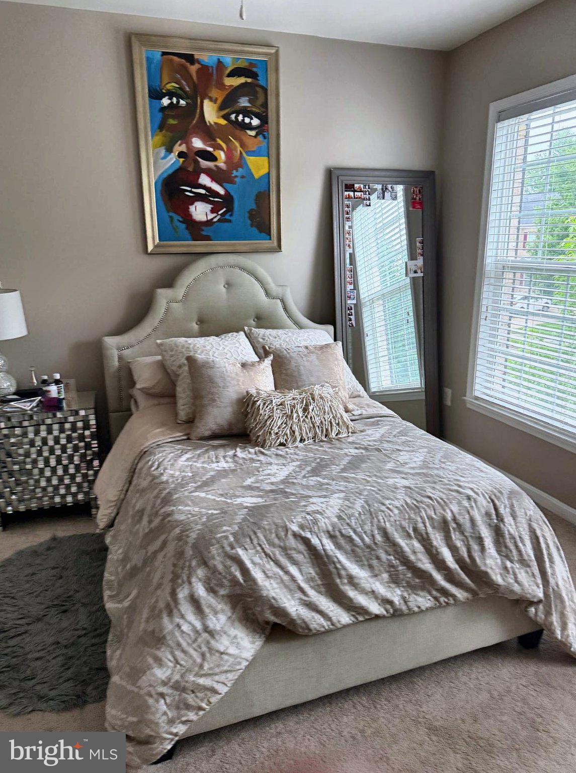 14108 Jones Bridge Road Upper Marlboro, MD 20774 - Photo 28 of 36 2nd bedroom - vibrant art enhances cozy retreat.