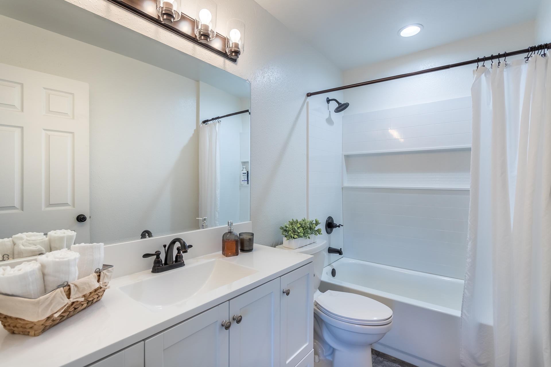 6380 Riverside Drive Redding, CA 96001 - Photo 25 of 46 a bathroom with a sink toilet tub and shower