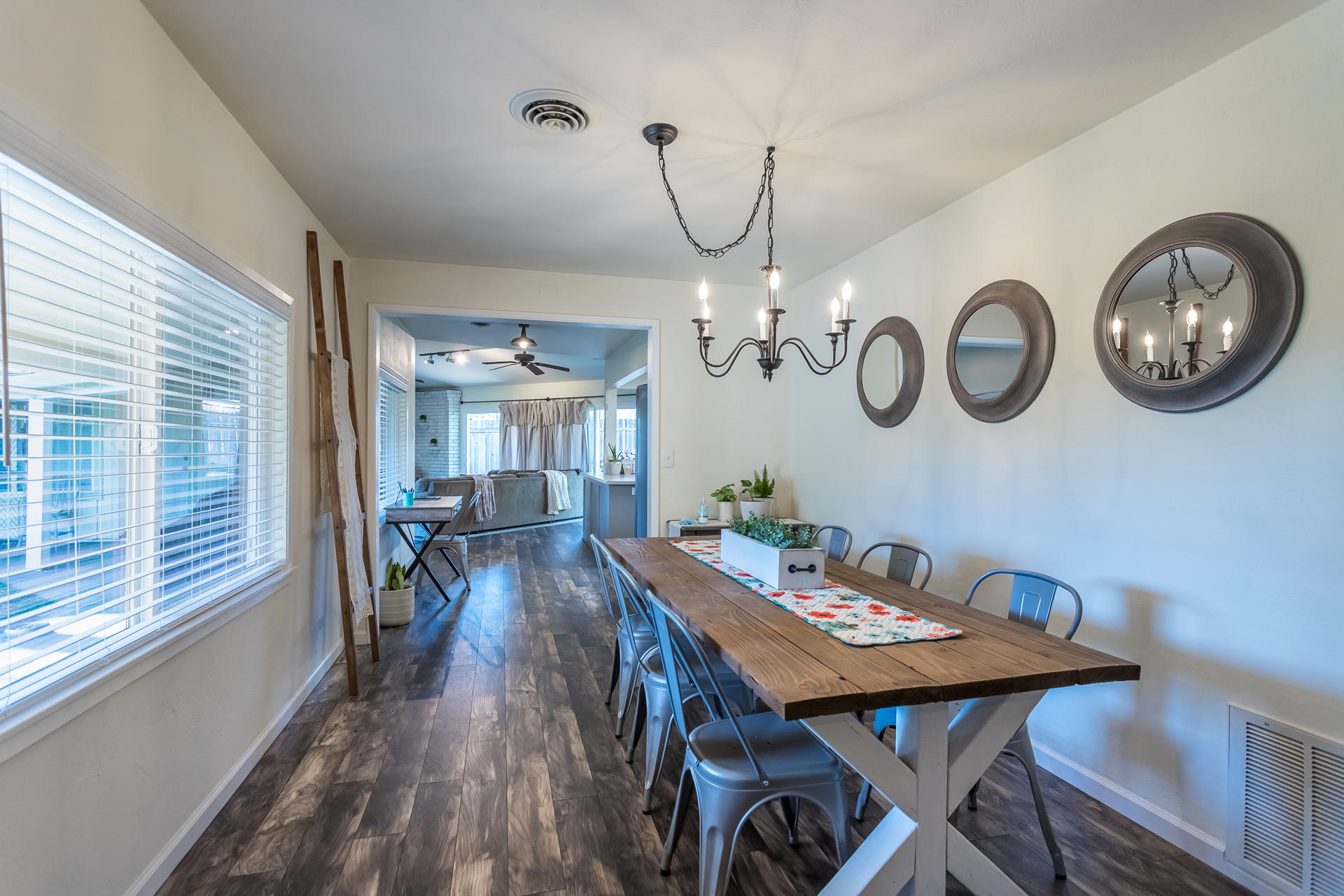 6380 Riverside Drive Redding, CA 96001 - Photo 5 of 46 a view of a dining room with furniture window and wooden floor
