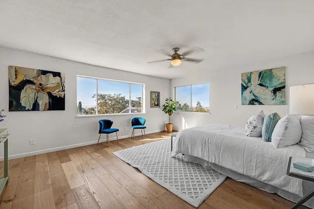 a living room with furniture rug and window