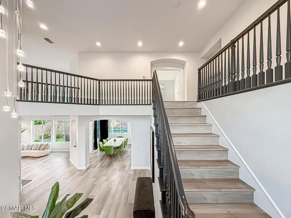 a view of entryway with wooden floor