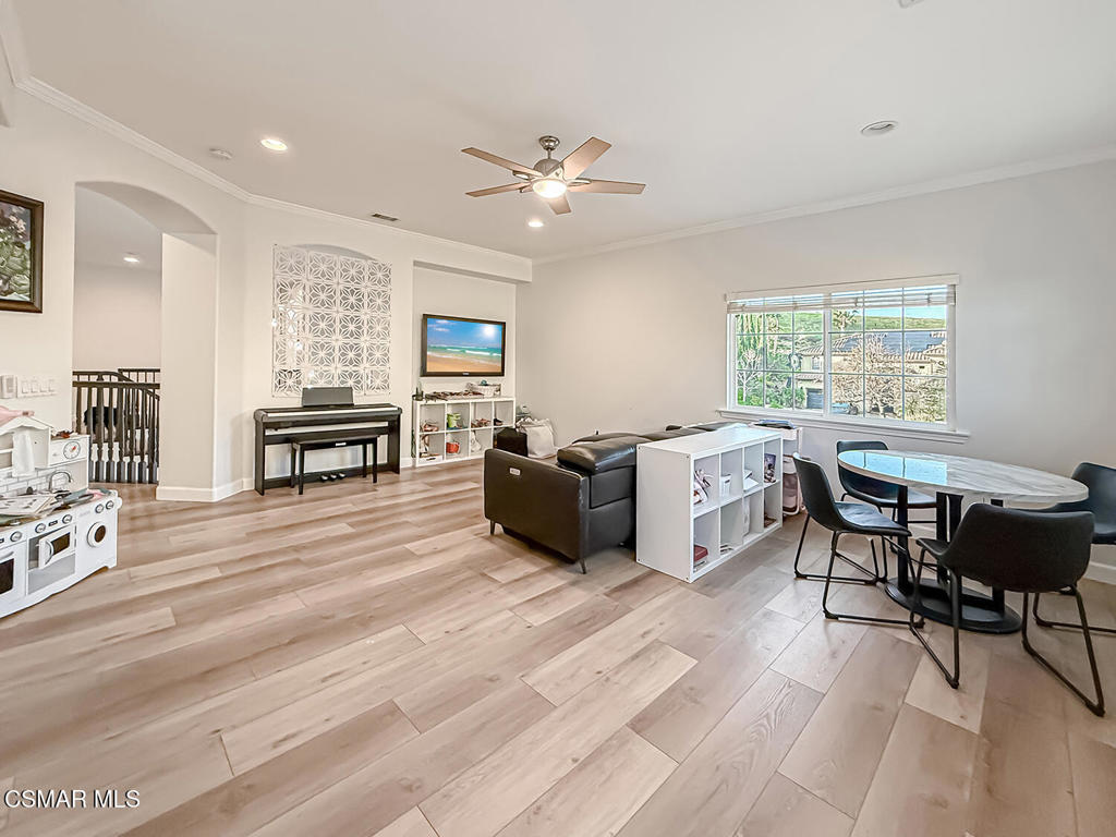 5816 Painted Pony Circle Simi Valley, CA 93063 - Photo 28 of 46 a living room with furniture a dining table and a window