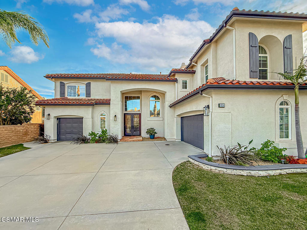 5816 Painted Pony Circle Simi Valley, CA 93063 - Photo 4 of 46 a front view of a house with garden