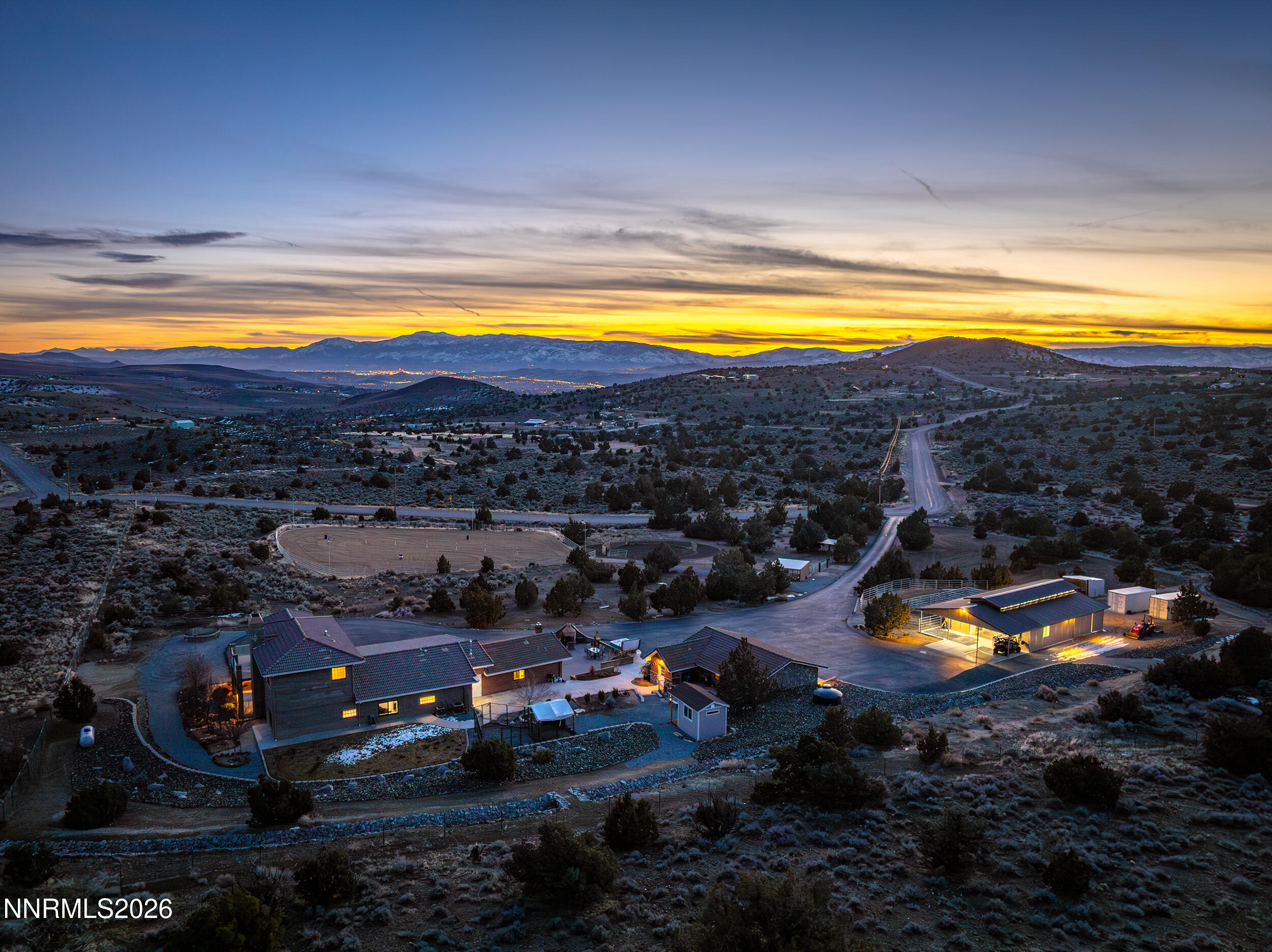 a view of a swimming pool and outside seating area