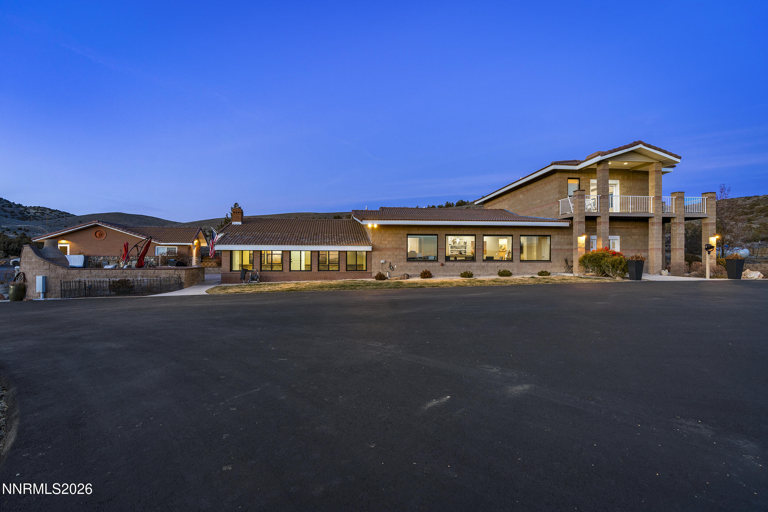 730 Encanto Drive Sparks, NV 89441 - Photo 18 of 87 a front view of a house with a street