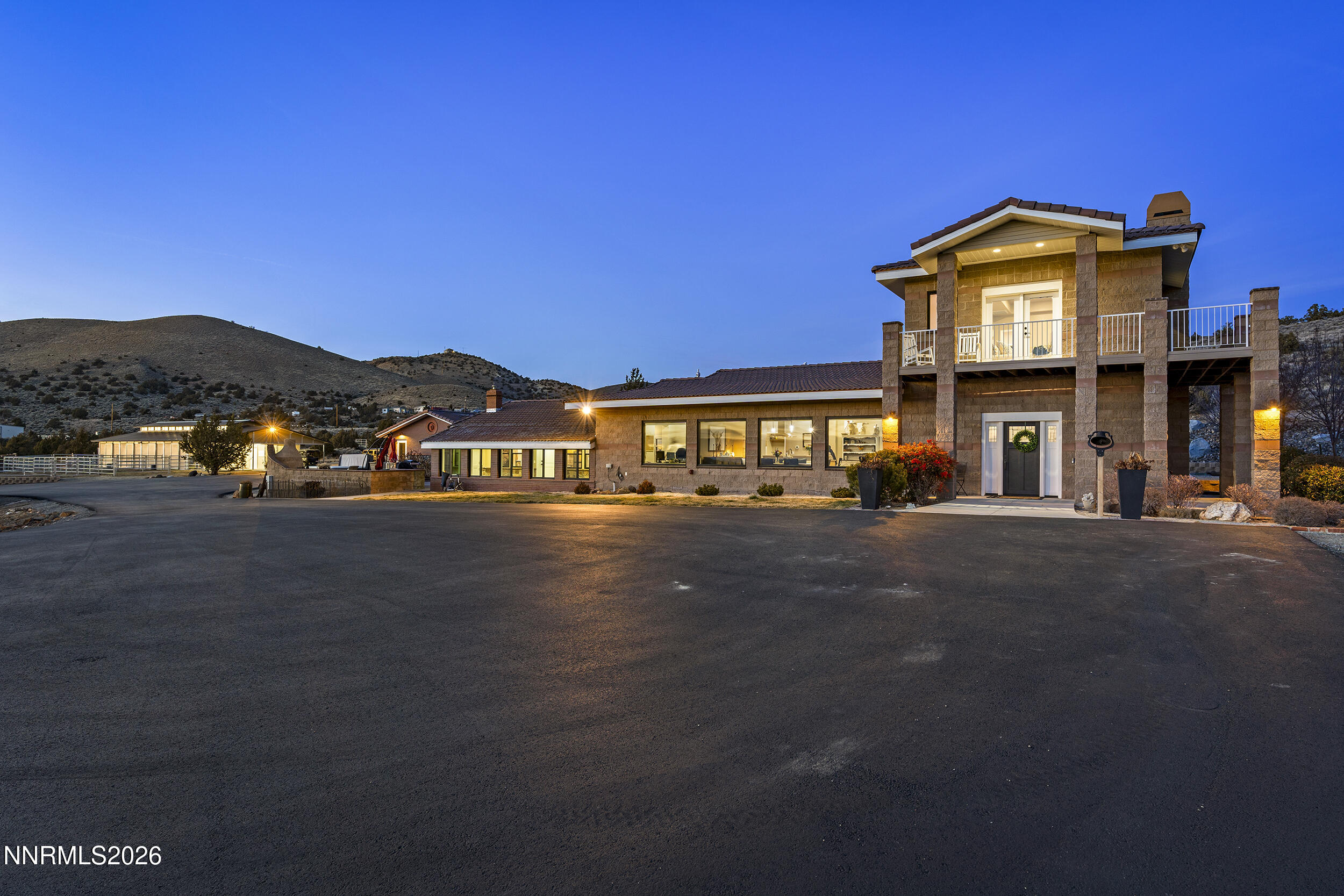 730 Encanto Drive Sparks, NV 89441 - Photo 2 of 87 a front view of a building with a road