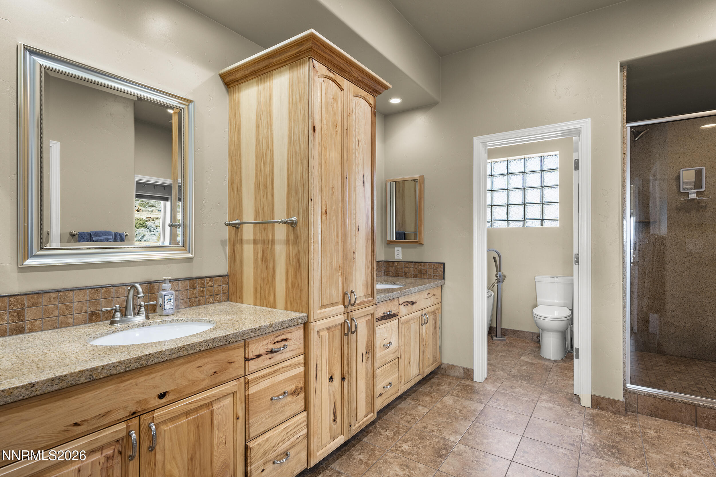 730 Encanto Drive Sparks, NV 89441 - Photo 26 of 87 a bathroom with a granite countertop sink toilet and shower