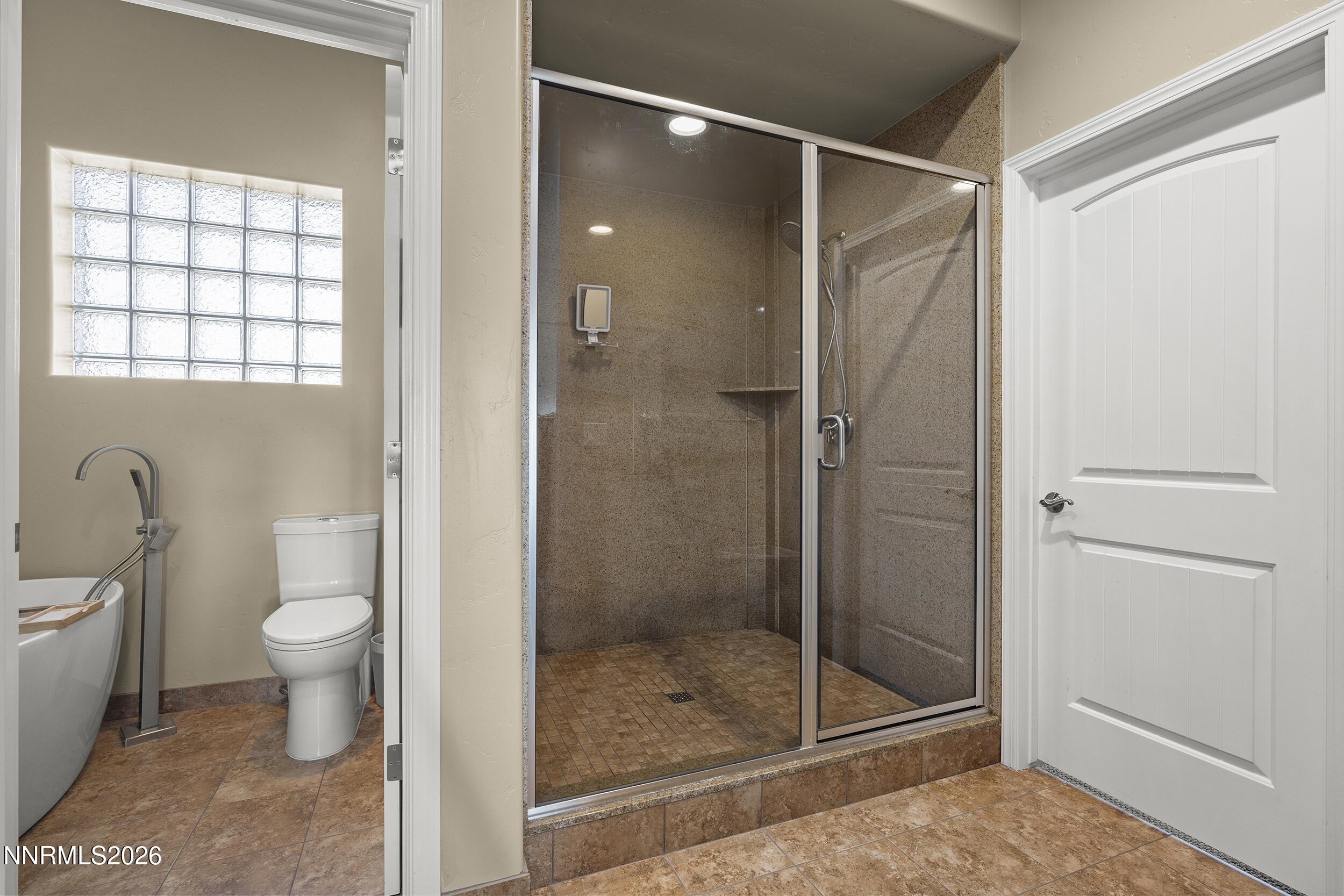730 Encanto Drive Sparks, NV 89441 - Photo 28 of 87 a bathroom with a shower and a toilet